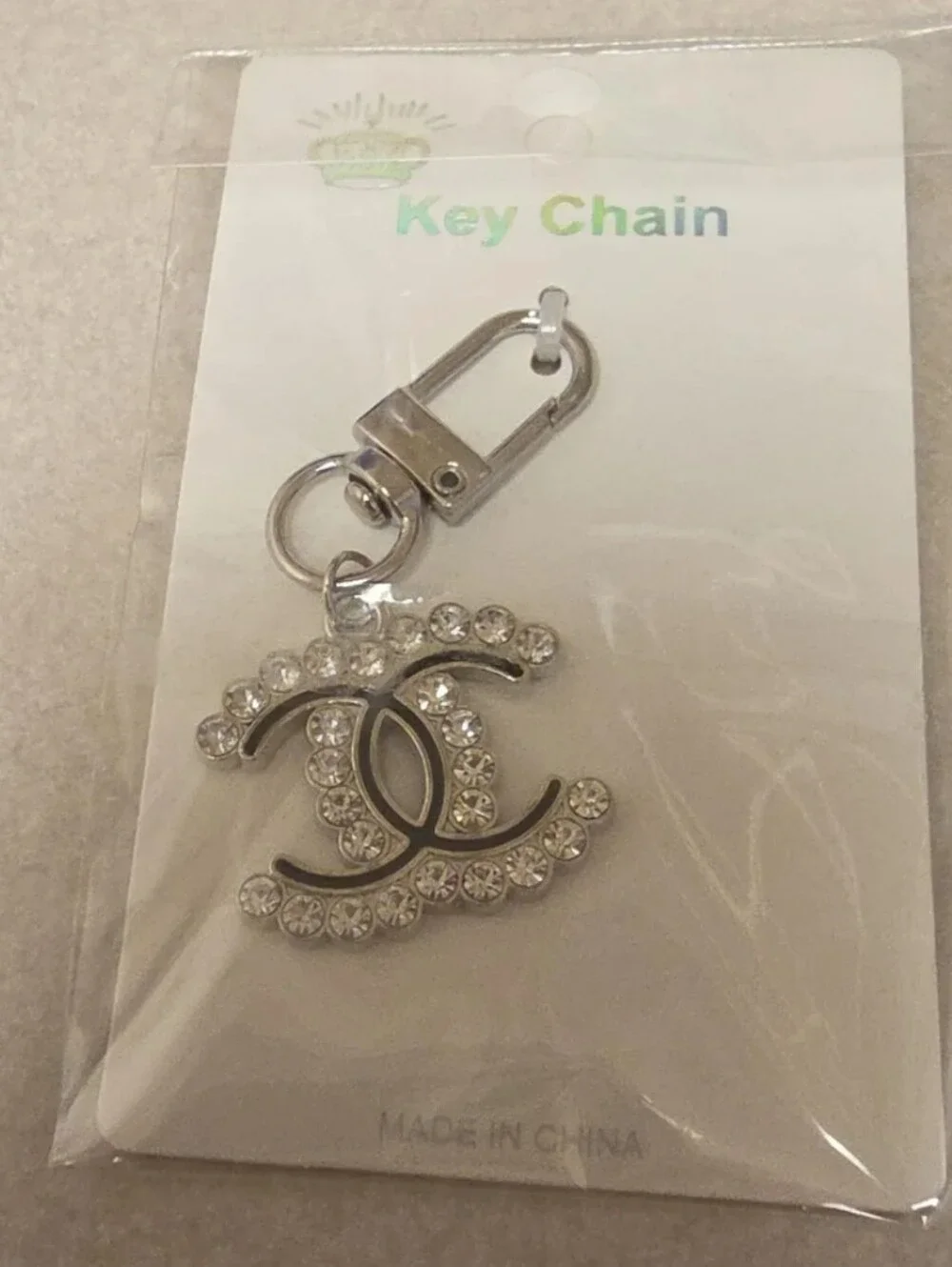 Rhinestone Interlocking Logo Key Chain - Gold or Silver